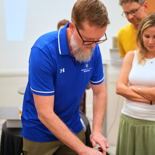 Dr. Bart Vermilya demonstrating an acupuncture technique